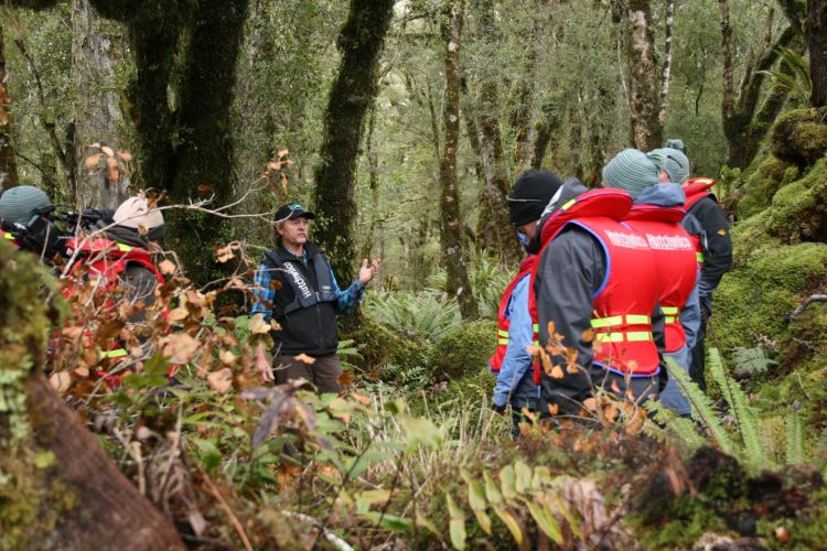 Johan with guests in Waitutu Forest